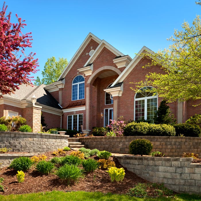 landscaping and retaining walls in front of residential home